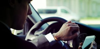 How can fleet managers prevent distracted driving among employees?