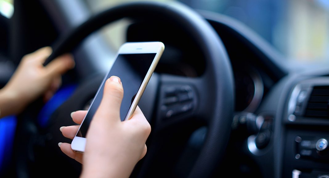 AAA research shows drivers in Georgia are still holding phone or texting while driving