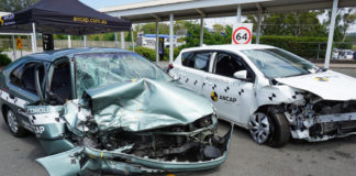 Crashed cars are used to encourage people to consider the safety of their own vehicles.