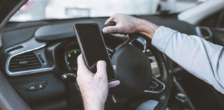 As of January 1, 2020, anyone caught texting and driving or holding a wireless device in a designated school crossing, school zone, or active work zone will be issued with a ticket.