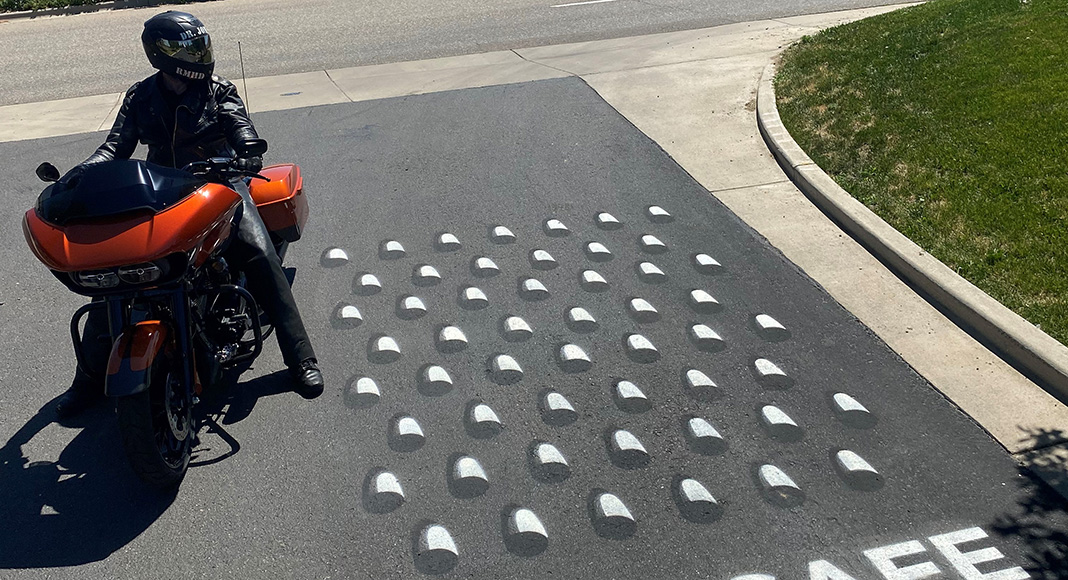 Cheese grater reminds motorcyclists to wear protective gear Three60