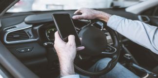 Under new laws introduced this month, people are breaking the law if they use a handheld mobile phone while driving for any use, including to take photos or videos, scroll through playlists or play games.
