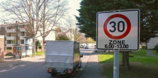 Often cities and towns limit speeds around schools, hospitals and shopping areas but signs can often be concealed by branches or surrounded by a cluster of other signs.